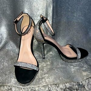 Black stilettos with rhinestone accents